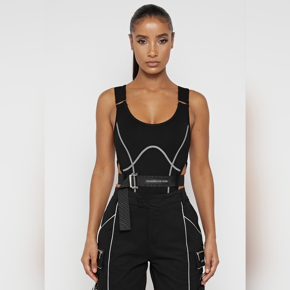 Manière de voir High Leg Reflective Bodysuit